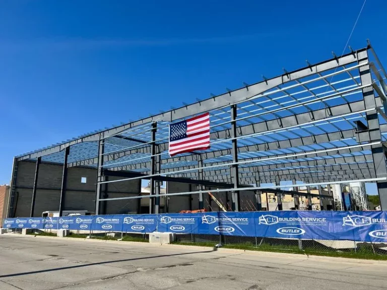 The american flag hangs high in the construction area of WAF's new expansion