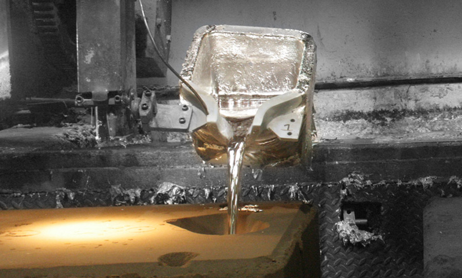 Melted aluminum is poured into a mold.