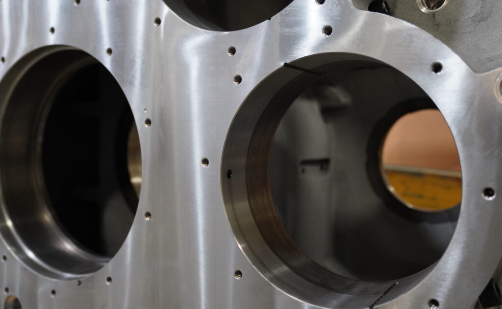 Close-up of large aluminum component with intricate interior cast by Wisconsin Aluminum Foundry.