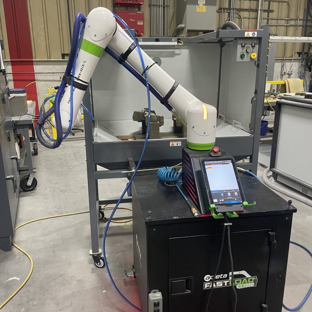 The FastLOAD CX1000, equipped with a FANUC 10kg, collaborative robotic arm, onsite at Wisconsin Aluminum Foundry.